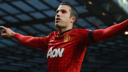 Robin van Persie celebrates after scoring Manchester United's second goal in the 2-0 win at home to Everton, which put his team 12 points clear in the English Premier League.