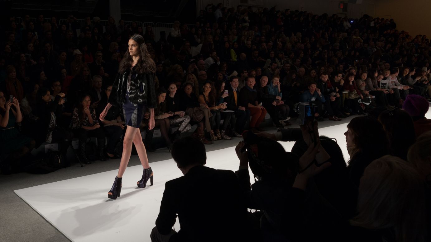 A Custo Barcelona model approaches the end of the catwalk on February 10.