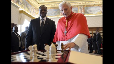 Benedict looks at a chess game with Ivory Coast President Alassane Ouattara during a private audience in November 2012 at the Vatican. 