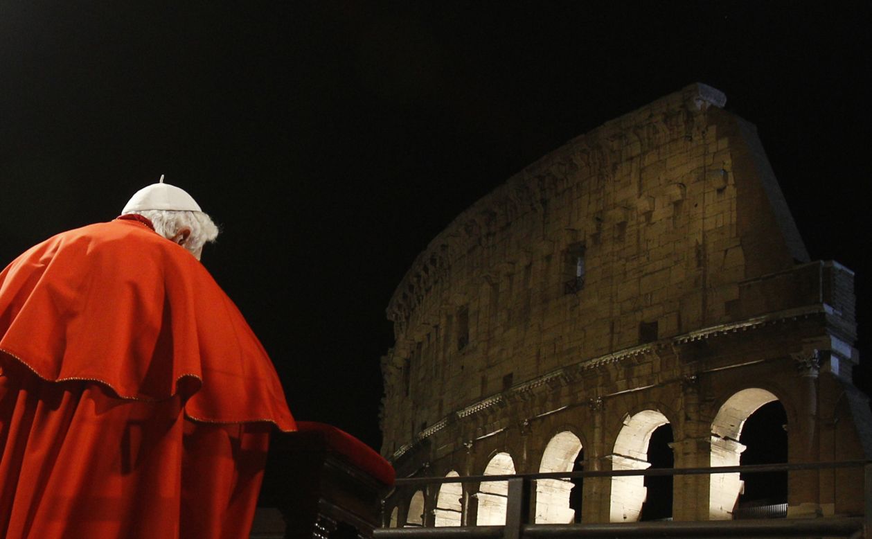 Benedict prays on Good Friday in April 2010 at the Roman Colosseum.