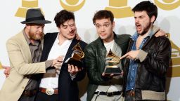 Mumford & Sons, winners of Best Long Form Music Video and Album of the Year, pose in the press room.