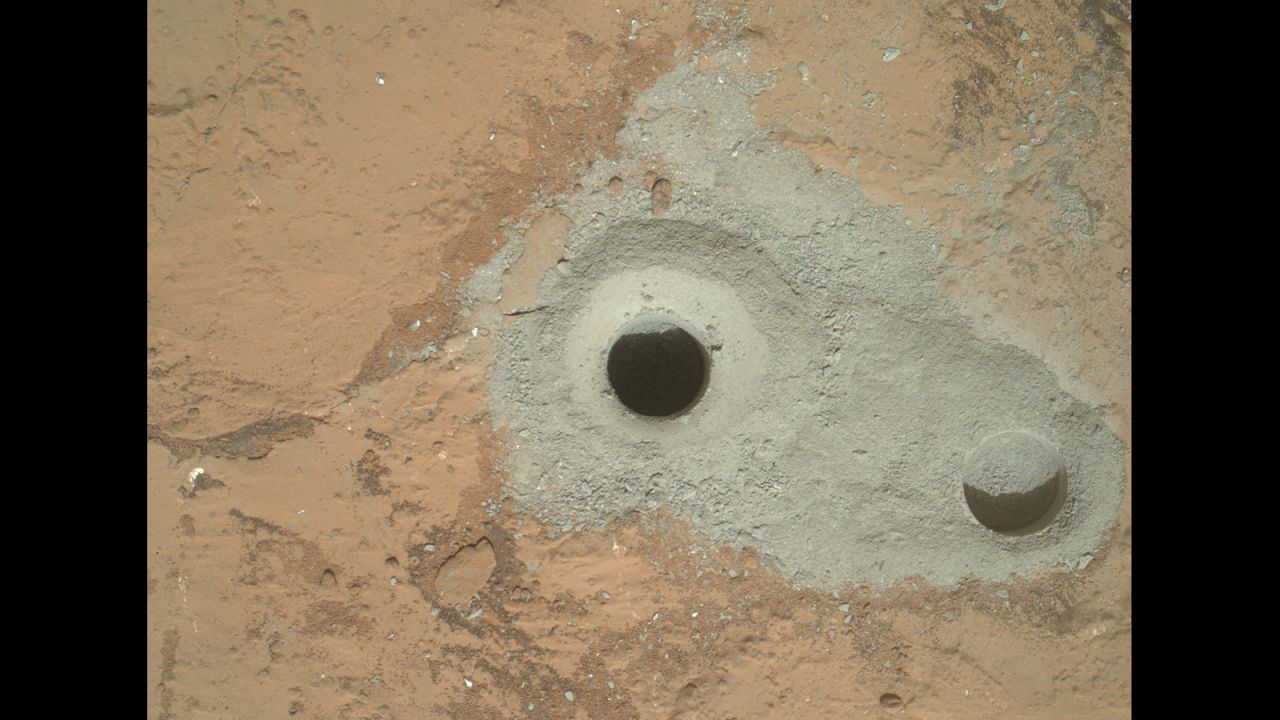 The rover drilled this hole, in a rock that's part of a flat outcrop researchers named "John Klein," during its first sample drilling on February 8, 2013.
