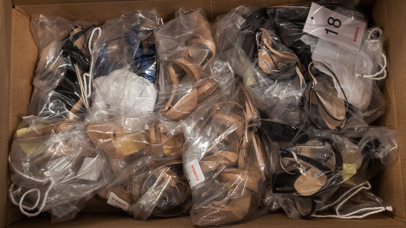 A wealth of shoes accumulate in a box backstage at the Carolina Herrera show on February 11.