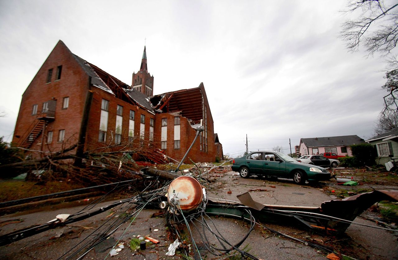 Power lines lie in the street near the roof-damaged Westminster Presbyterian Church on February 11 after a tornado ripped through Hattiesburg.