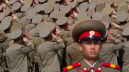 North Korean soldiers salute during a military parade in Pyongyang on April 15, 2012.