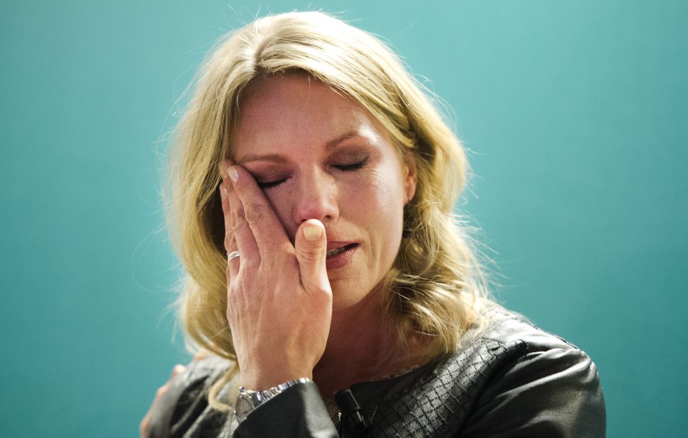 Esther Vergeer wipes away a tear after announcing her retirement from wheelchair tennis at a press conference in Rotterdam, where she is a director of an able-bodied men's tournament. 