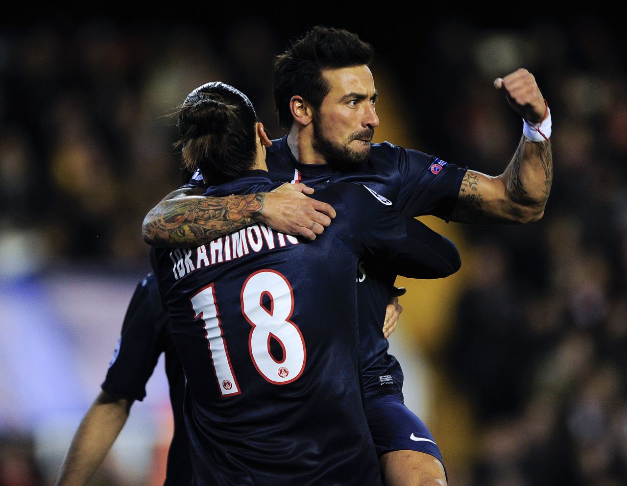Ezequiel Lavezzi celebrates his early strike for Paris Saint-Germain with teammate Zlatan Ibrahimovic. The Argentine struck in the 10th minute and has now scored in each of his past three Champions League games.