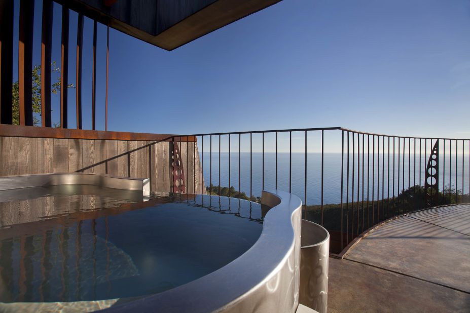 The deck of the Upper Pacific Suite at the Post Ranch Inn in Big Sur, California, offers spectacular views of the ocean from its outdoor hot tub.