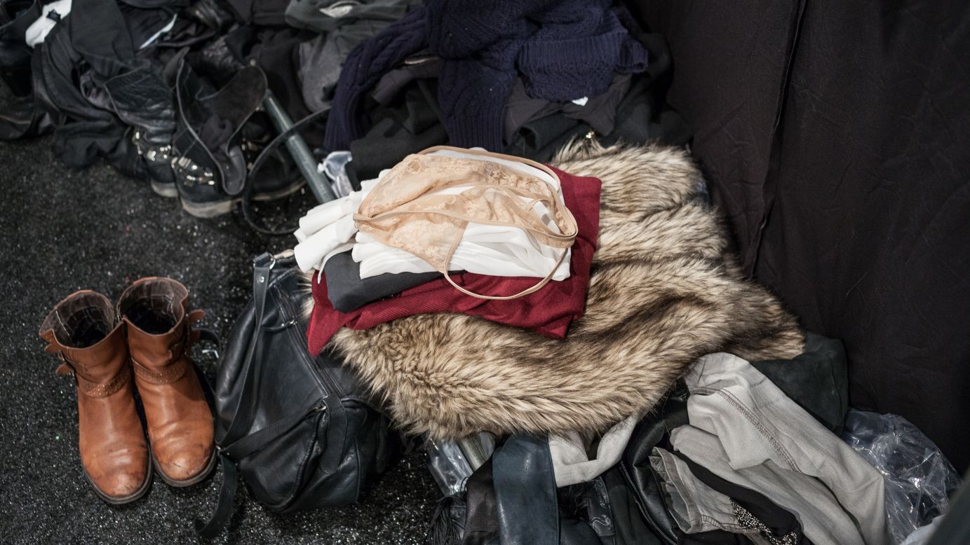 Clothes are piled up at a change station backstage at the Brandon Sun show on February 13.