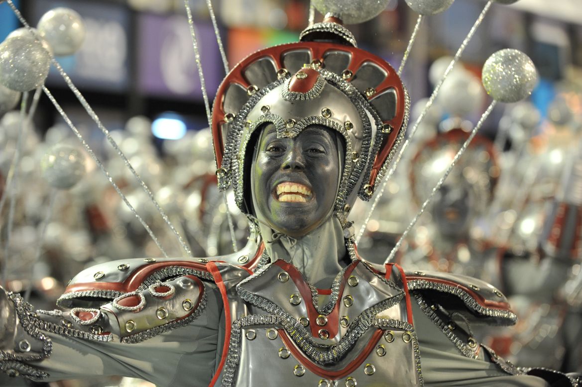 Like something out of the 1980 film "Flash Gordon," this performer from the Unidos da Tijuca samba school shows off the pearly whites. This samba school is the defending champion.