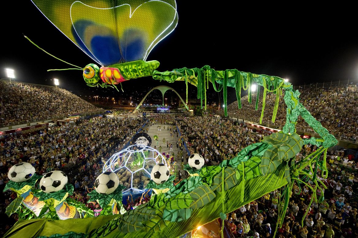 Somehow, a giant dragonfly and footballs seem entirely suitable at Rio Carnival. This ambitious float didn't fare well, crashing into a TV tower soon after this photo was taken. Though there were no reports of casualties, elsewhere in the country <a href="http://edition.cnn.com/2013/02/12/world/americas/brazil-carnival-deaths/index.html?hpt=hp_t3">four people were tragically electrocuted when a float struck power lines</a> in the port city of Santos.