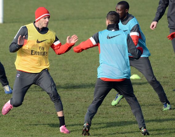 Beckham, 37, was put through is paces at the club's open training day where more than 100 journalists turned up to witness the event. The former Manchester United and Real Madrid star is hoping to make his debut against Sochaux on Sunday, but it's not known if his pop star wife Victoria will be in attendance. Beckham's family has remained in London where his children Brooklyn, Romeo and Cruz attend school following their move from Los Angeles.