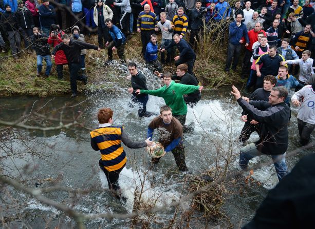 The game has no rules, or marked pitch, so the battle can move into the Henmore river.