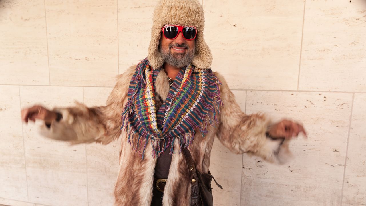 Another guest shows off his inherited antique coyote fur coat on February 8.