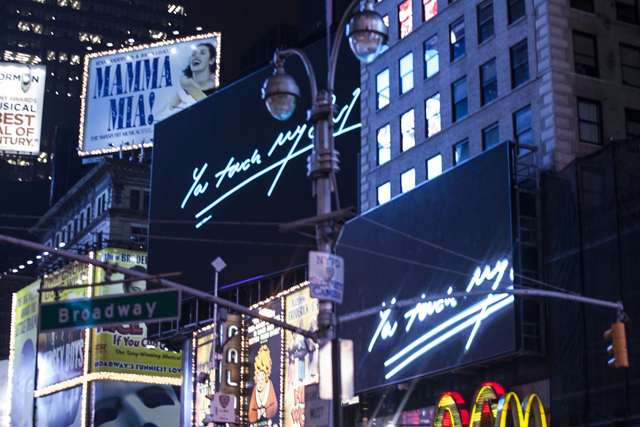 "I Promise to Love You," a series of visual valentines messages by Emin, will be spelled out across 15 huge billboards in Times Square throughout February.