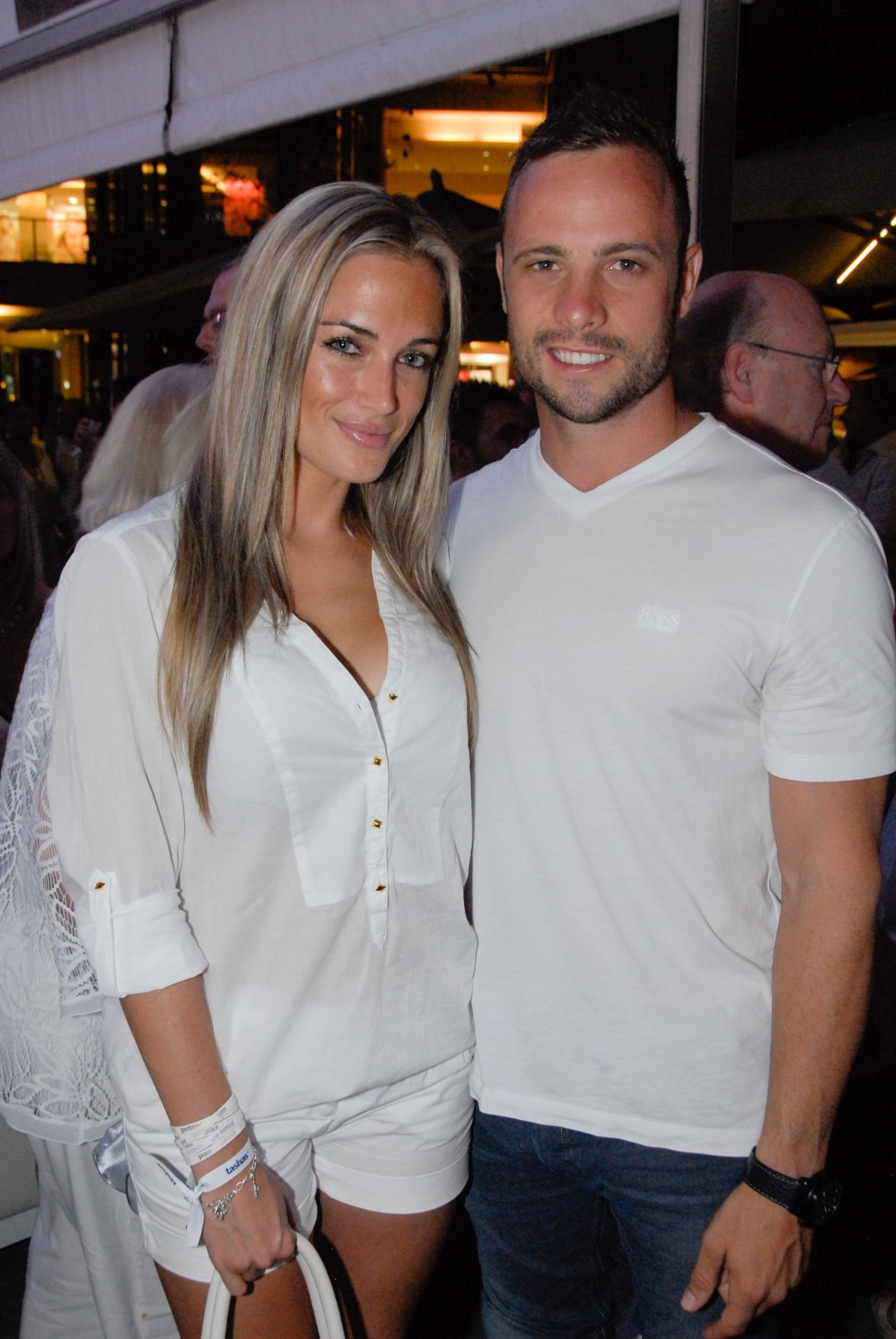 A picture taken on January 26, 2013 shows Oscar Pistorius posing next to his girlfriend Reeva Steenkamp at Melrose Arch in Johannesburg. 