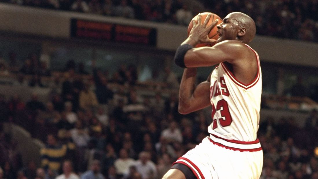 Jordan dunks the ball against the Charlotte Hornets in 1995.