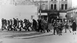British paratroopers take away civil rights demonstrators on 'Bloody Sunday' after the paratroopers opened fire on a civil rights march, killing 14 civilians, January 30, 1972 in Londonderry, Northern Ireland. 