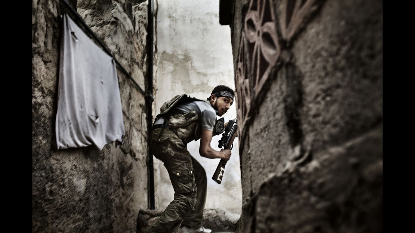 <strong>Second prize -- spot news stories: </strong><br />A Free Syrian Army fighter during clashes against government forces in Aleppo, Syria, on October 10, 2012.
