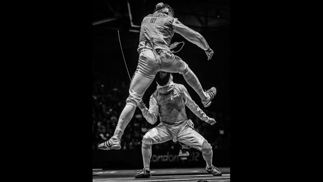 <strong>Second prize sports -- sports action stories: </strong>Egypt's<strong> </strong>Alaaeldin Abouelkassem, top, moves against Peter Joppich of Germany during their men's fencing match on July 31, 2012, during the London Olympics.