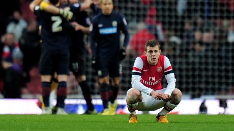 Jack Wilshire ponders another loss to lower-league oppostion as Arsenal exit another domestic cup compettion.  