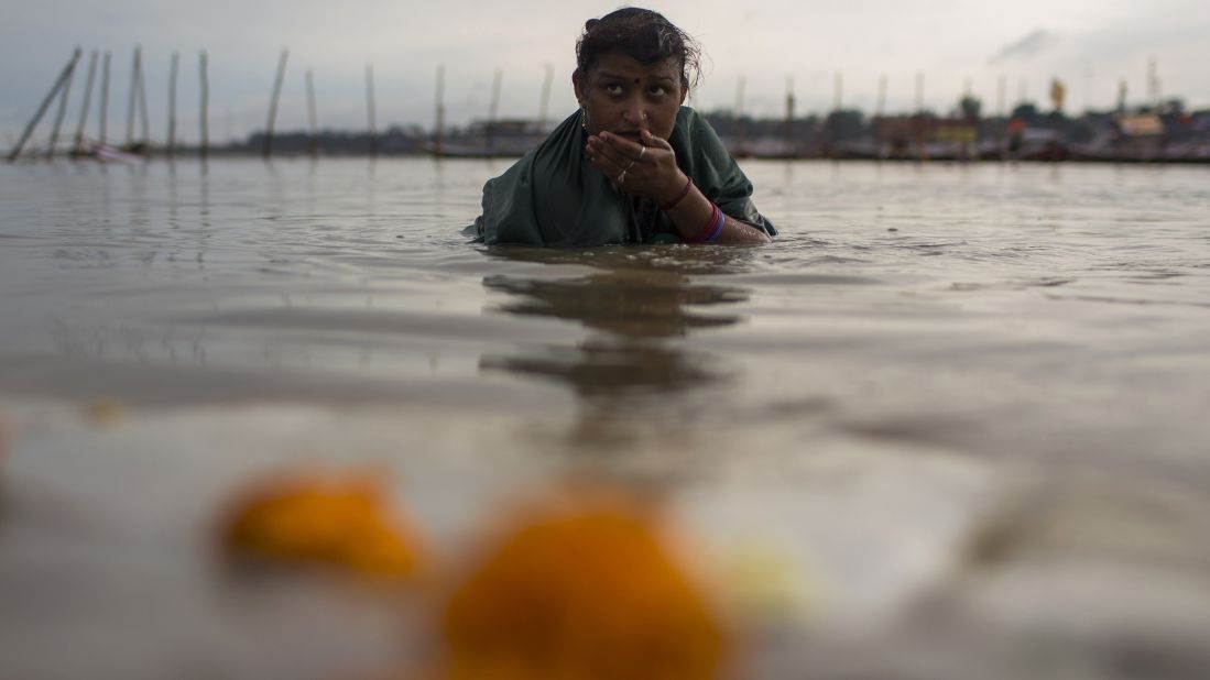 A Hindu devotee bathes in the Sangam on February 16.