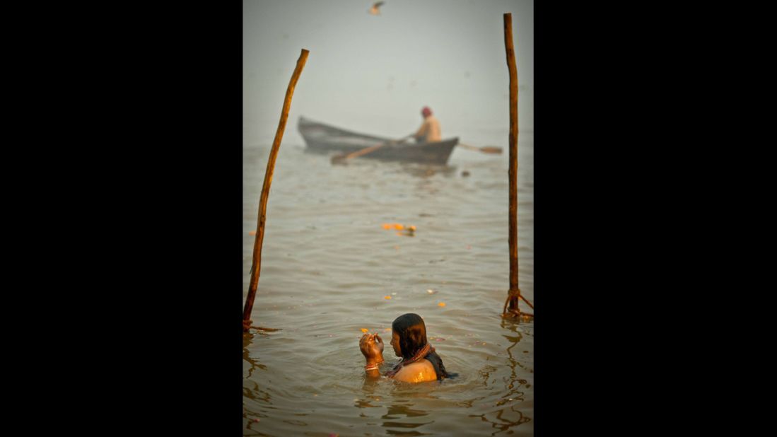 A woman bathes in the Sangam on February 17.