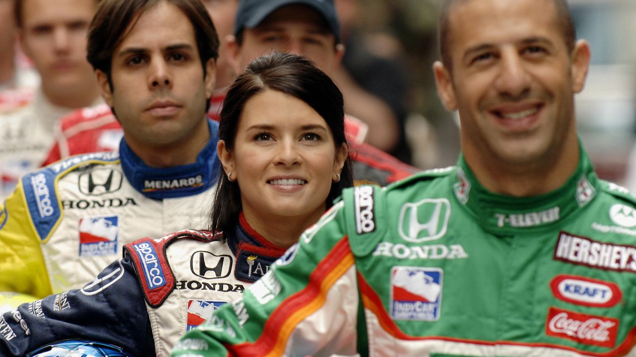 From left: Vitor Meira, Patrick and Tony Kanaan pose for a photograph in 2005 in Times Square.