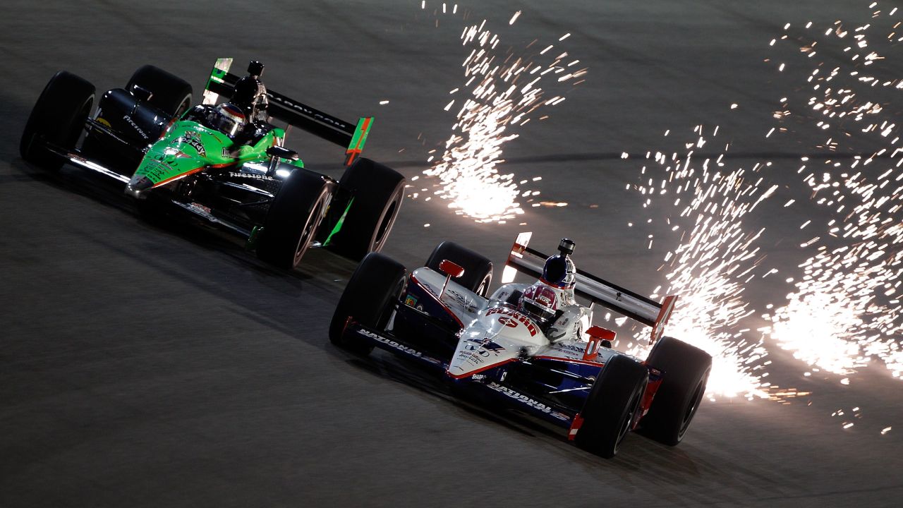 Patrick, left, drives next to Dan Wheldon during practice for the Cafes do Brasil Indy 300 in 2010 in Homestead, Florida. <a href="http://www.cnn.com/2011/10/16/us/indycar-crash">(Wheldon died in 2011 at the Las Vegas Indy 300).</a>