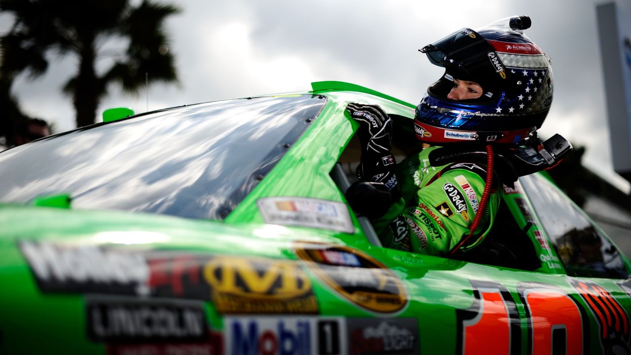 Patrick gets out of her car after qualifying for the Daytona 500 in 2012.