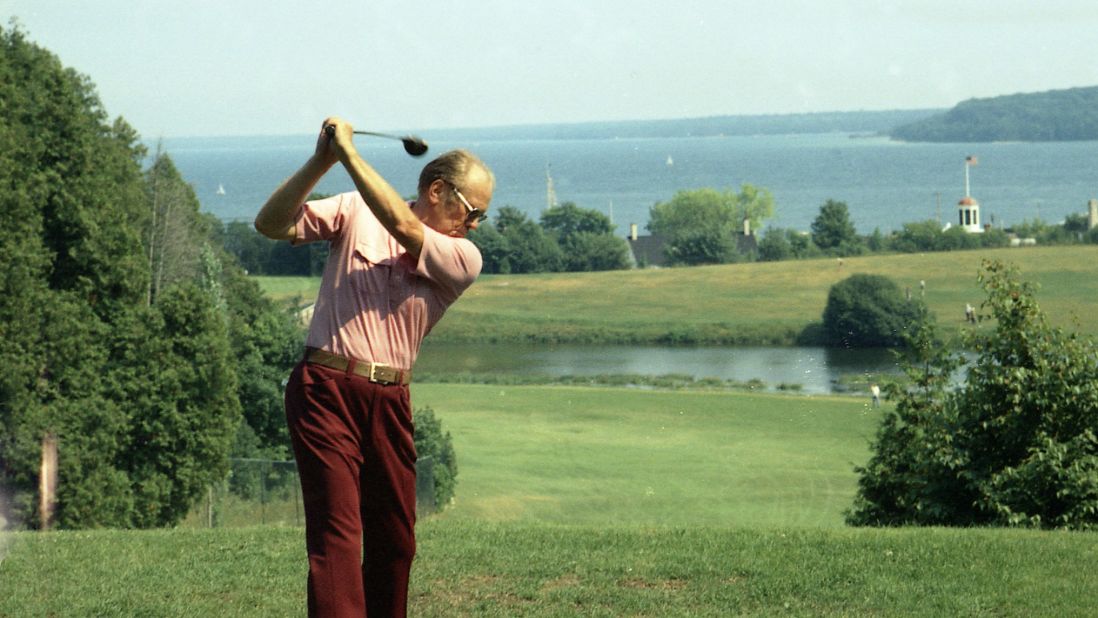 President Gerald Ford plays golf during a working vacation on Mackinac Island in Michigan on July 13, 1975.
