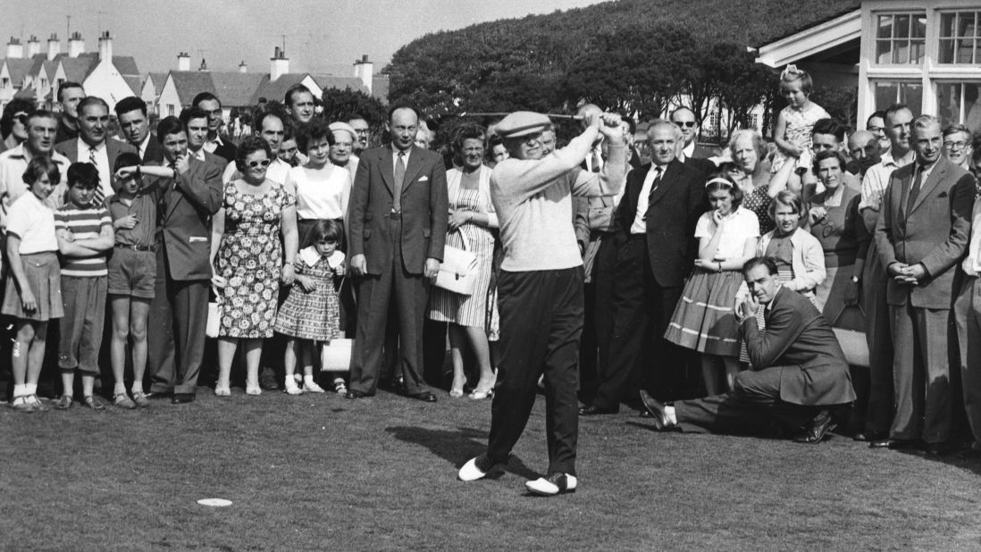President Dwight D. Eisenhower drives down the fairway at Turnberry golf course during a weekend stay at Culzean Castle on the Ayrshire coast of Scotland on September 5, 1959. Eisenhower often carried a club in the Oval Office and took swings while dictating to his secretary.