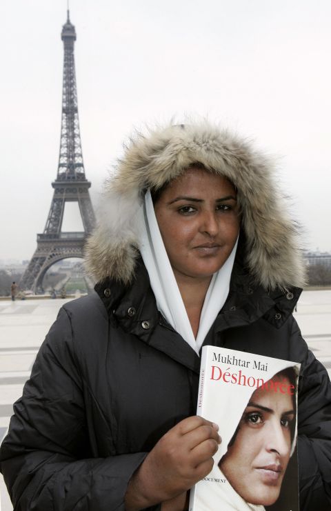 Mai wrote a book about her experience that was published in 2006. It has since been translated into 23 languages. Here she is seen posing with the French edition outside the Eiffel Tower in Paris. 