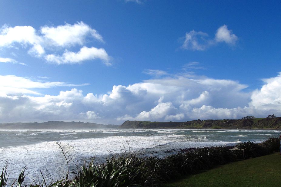 After Cindy Schultz captured this image of clear skies and calm water at Raglan Beach, New Zealand, the weather dramatically changed before her eyes. "Blue skies and white puffy clouds gave way to dark skies and black clouds within a matter of minutes," she says. "It was beautiful, whether the water was blue or gray."