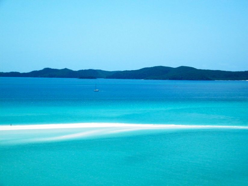 Luke Schwerdtfeger spent the night on a chartered sailboat, and when he woke up the captain told passengers they were going to "the finest sand beach in the world." After hiking through a forested area off the main beach, Schwerdtfeger arrived at a lookout point where he snapped these photos of Whitehaven Beach in Australia.