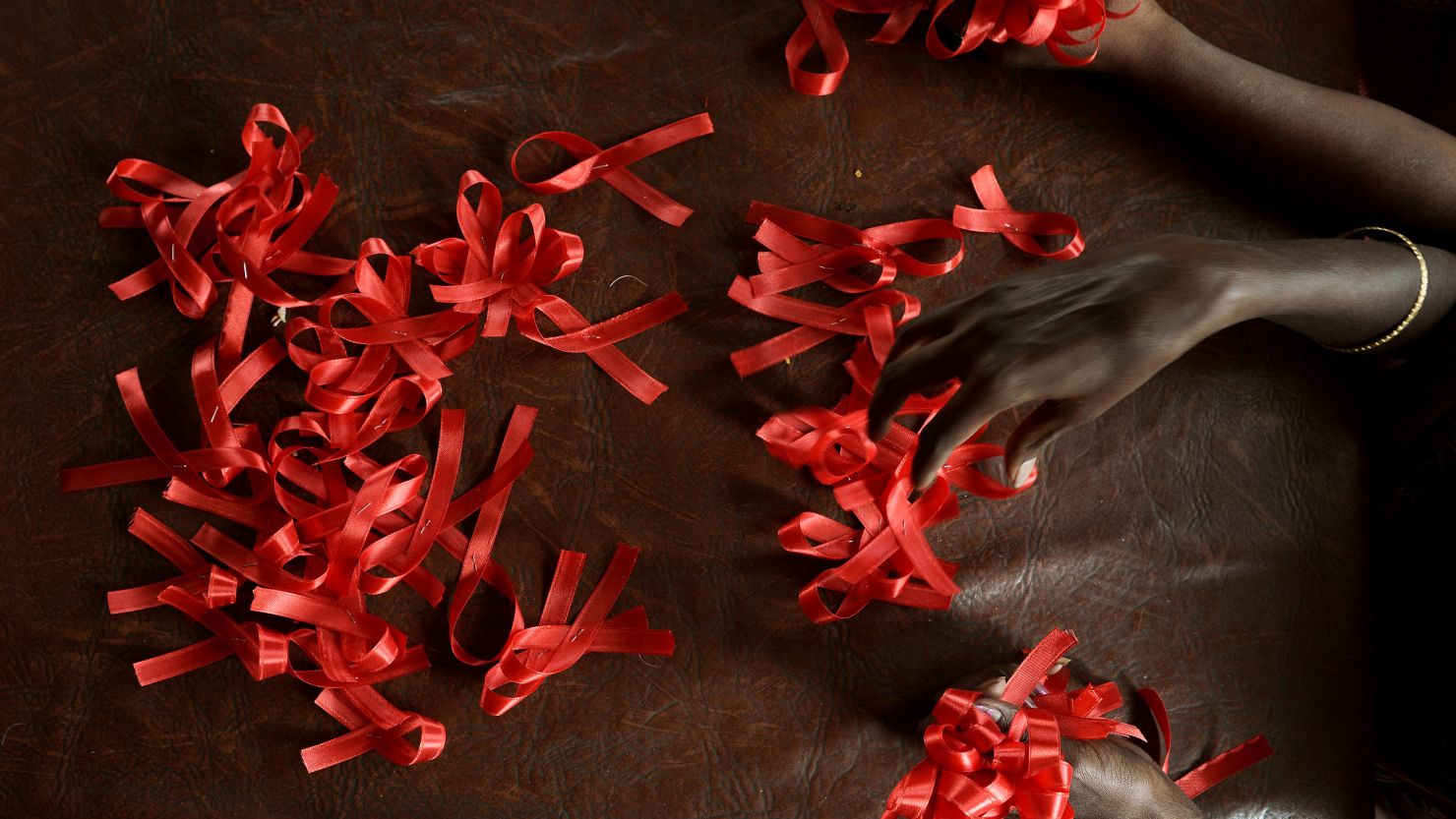 (File photo) Red ribbons, the universal symbol of awareness and support for those living with HIV.