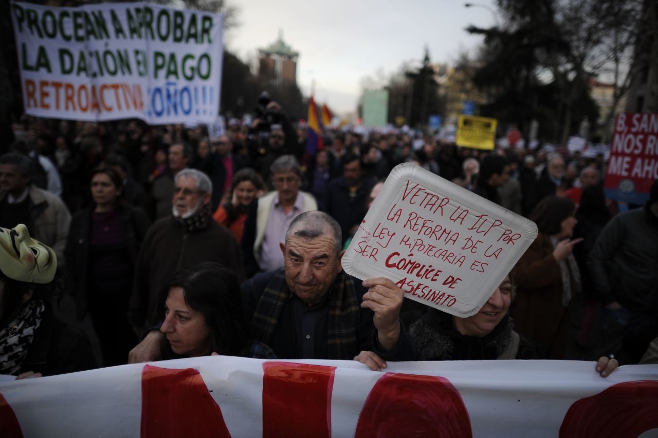 People attend a demonstration called by the organization Platform for Mortgage Victims on February 16 in Madrid. 
