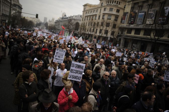 Protesters take part in a demonstration against plans to cut medical spending and privatize hospital services in Madrid of February 17.