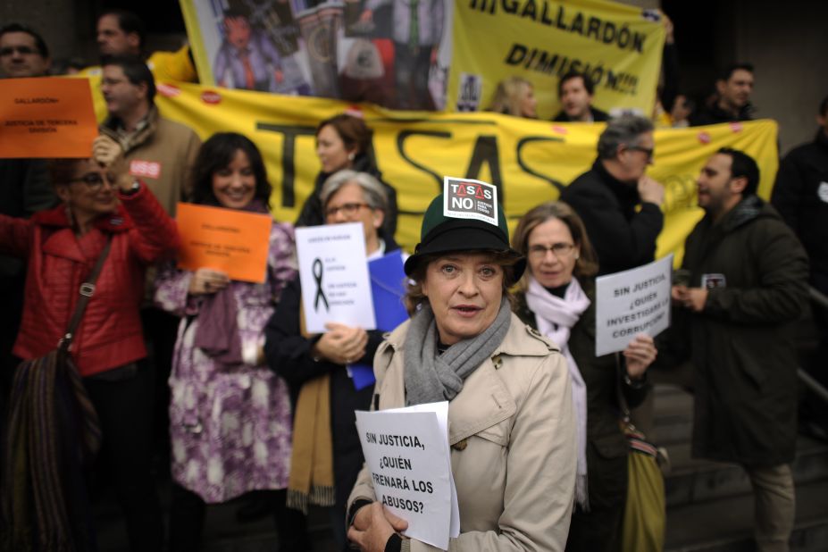 Court officials protest on February 20 in Madrid, during a strike called by judges, prosecutors and justice workers against the government's spending cuts.