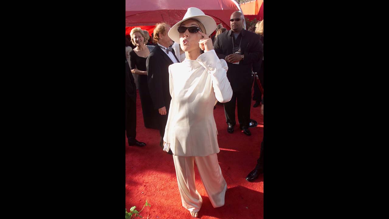 Celine Dion took a fashion risk in 1999 when she wore a white suit and hat, with the Jacket backwards.