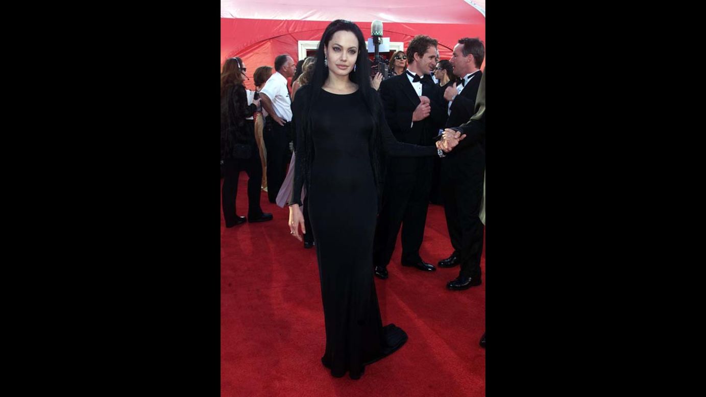 We get it: Angelina Jolie has a personal style. It often involves a lot of black -- and sometimes clingy -- fabrics. But even Morticia Addams would dress it up a bit when going to the Oscars. Especially if she was going to walk away with the best supporting actress award, as Jolie did in 2000.