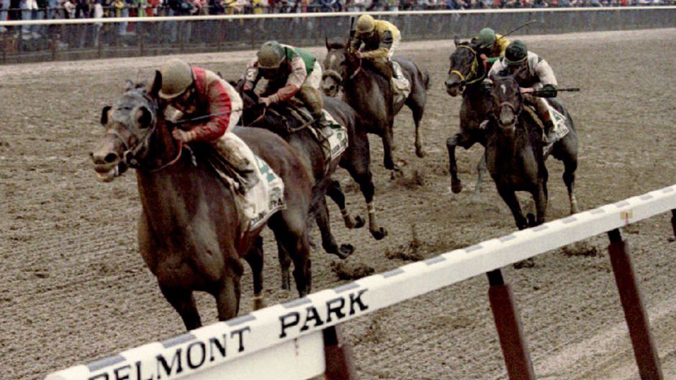 Jockey Julie Krone rides Colonial Affair across the finish line to win the Belmont Stakes on June 5, 1993. She was the first woman to win a Triple Crown race.