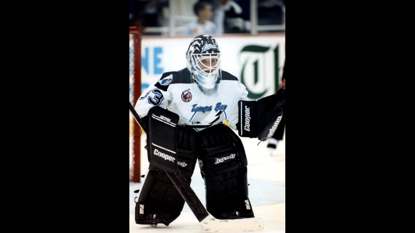 Goalie Manon Rheaume of the Tampa Bay Lightning defends the net during an NHL preseason game against the St. Louis Blues in Tampa on September 23, 1992. She was the first female to play in an NHL game.