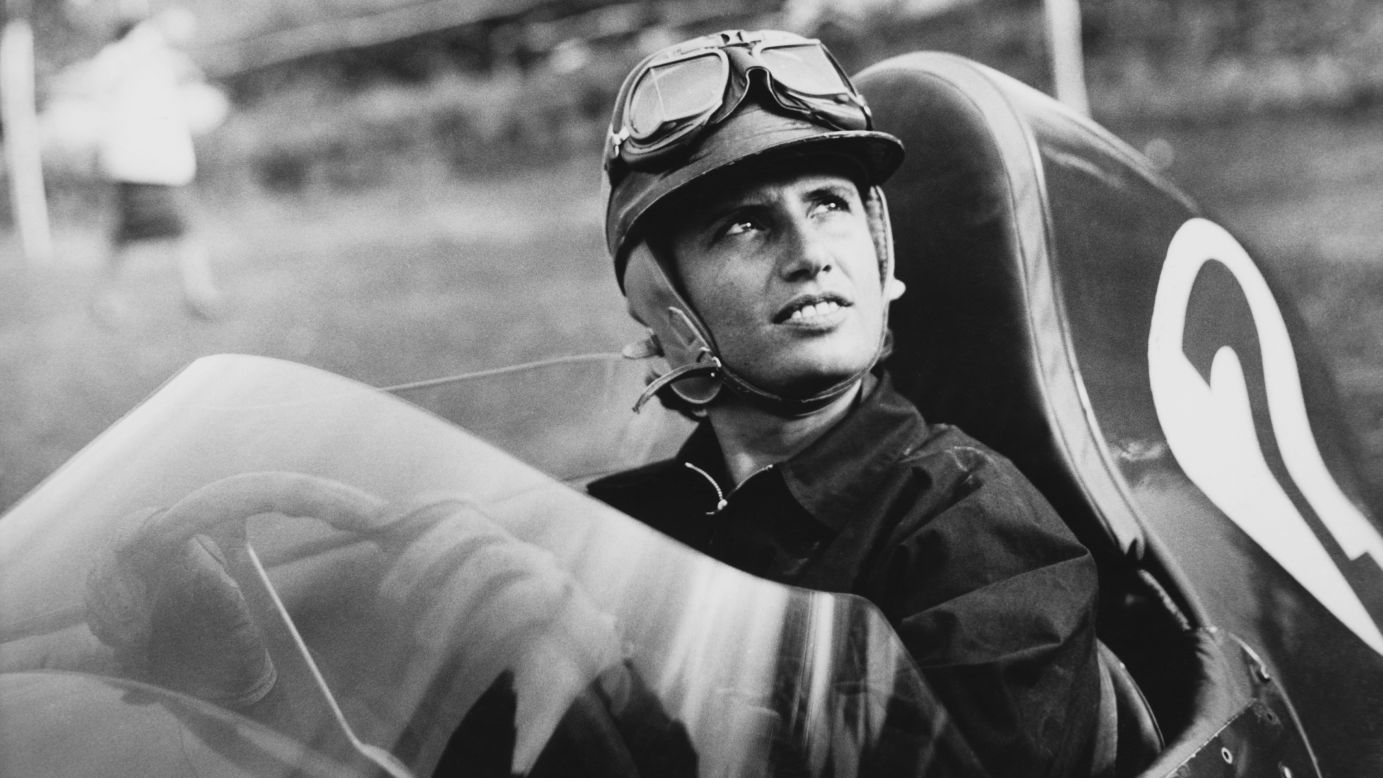 Italian race car driver Maria Teresa de Filippis is seen at the wheel of a Maserati in 1958. She was the first woman to compete in a Formula One race.