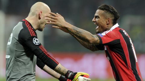 Goalkeeper Cristian Abbiati and Kevin-Prince Boateng celebrate Milan's unexpected 2-0 win over the tournament favorites