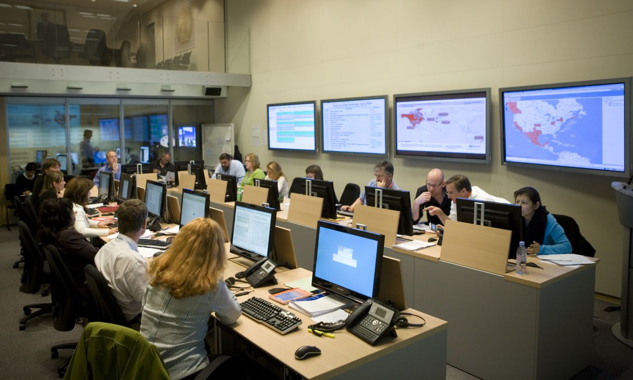 In the basement of the World Health Organization in Geneva, Switzerland sits the "SHOC", or Strategic Health Operations Center. This room acts as the nerve center of WHO's global epidemic response providing a single point of coordination for response to acute public health crises.