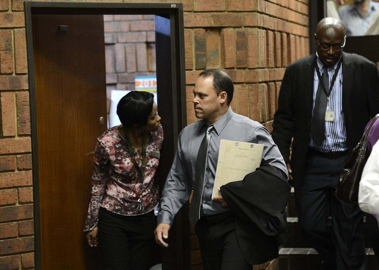 South African detective Hilton Botha, the investigating officer in the Oscar Pistorius case, himself faces seven charges of murder for shooting at a taxi with seven passengers in it.