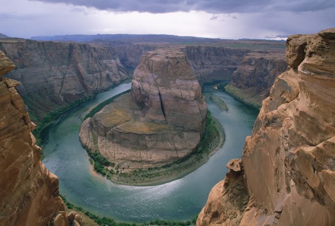 Called "King Bend," by locals, the U-shaped meander of the Colorado River known to the world as Horseshoe Bend flows 1,000 feet below the overlook.