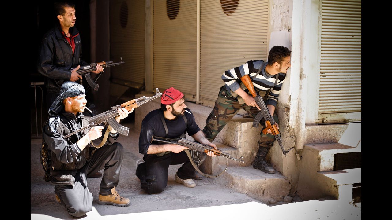 Rebels prepare to engage government tanks that advanced into Saraquib on April 9.