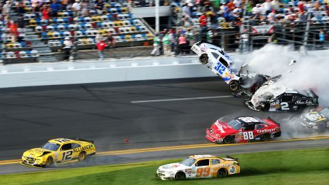 Kyle Larson, driver of car No. 32, and Brian Scott, driver of car No. 2, collide at the finish of the NASCAR Nationwide Series DRIVE4COPD 300 at Daytona International Speedway on Saturday, February 23 in Daytona Beach, Florida.